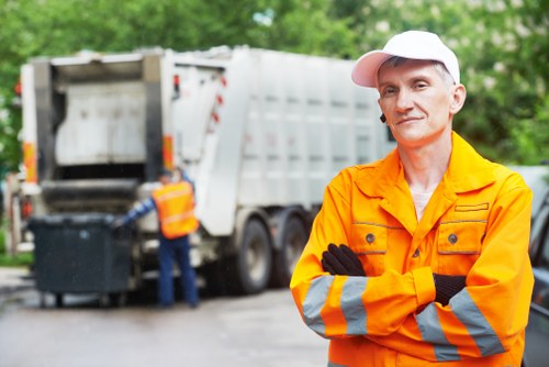 Construction site with waste clearance vehicles